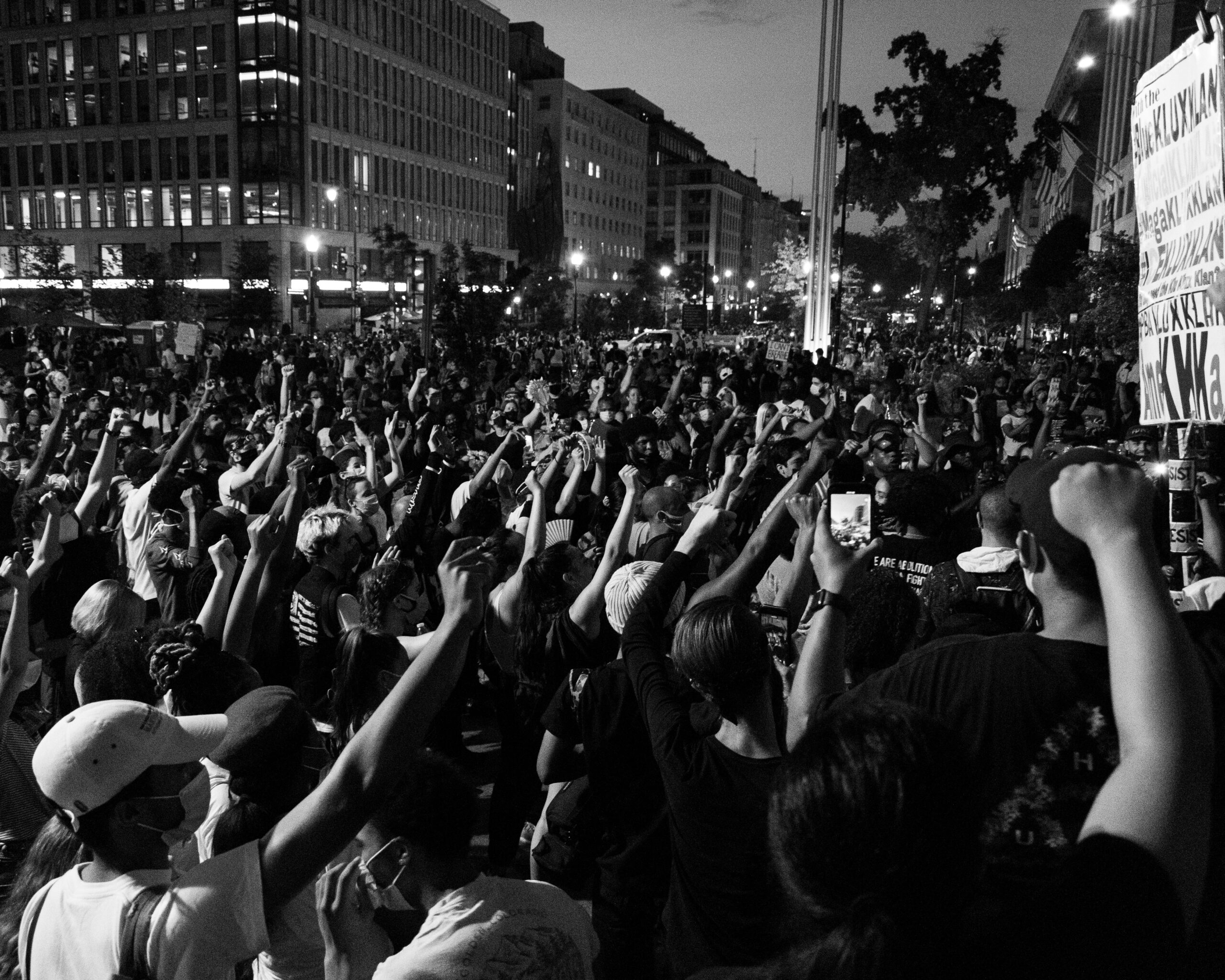 Large Black community protest or gathering in an urban setting