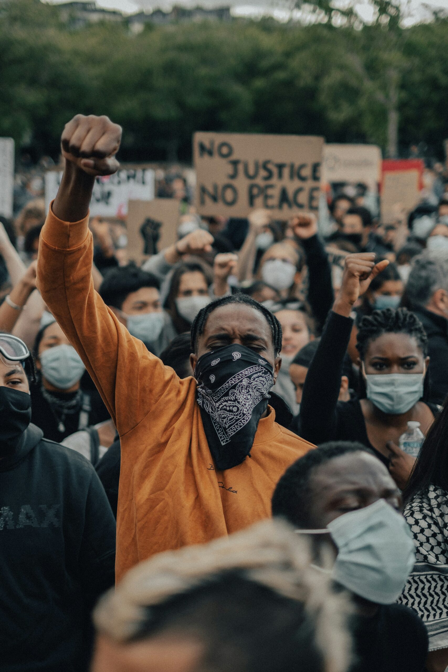 Black women smiling and standing together